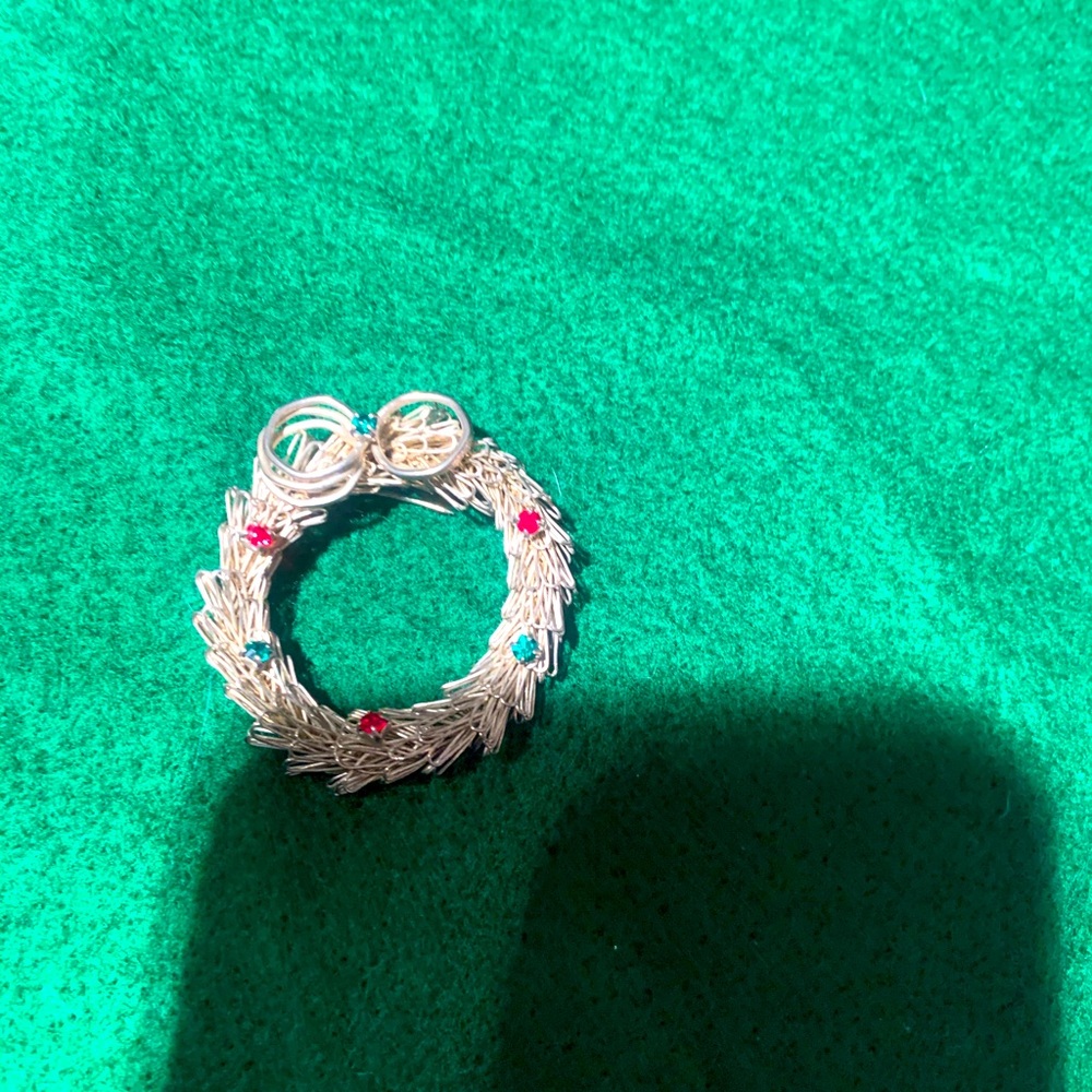 small silver tone Christmas wreath brooch with rhinestone accents